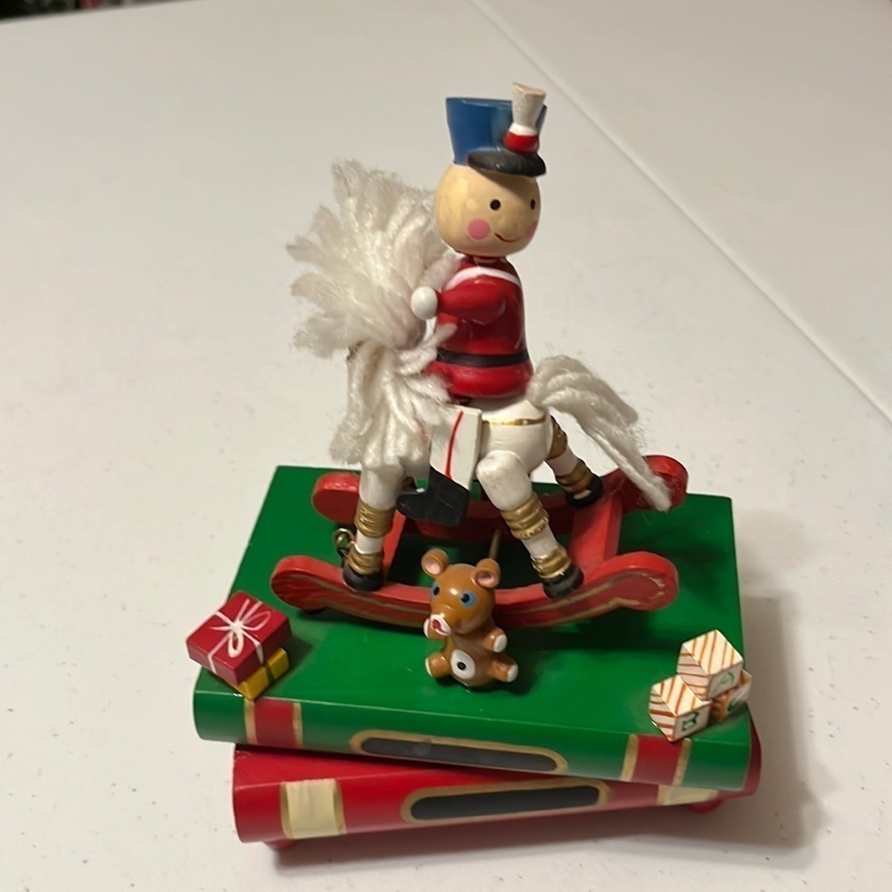 Rocking horse music box, plays school days .